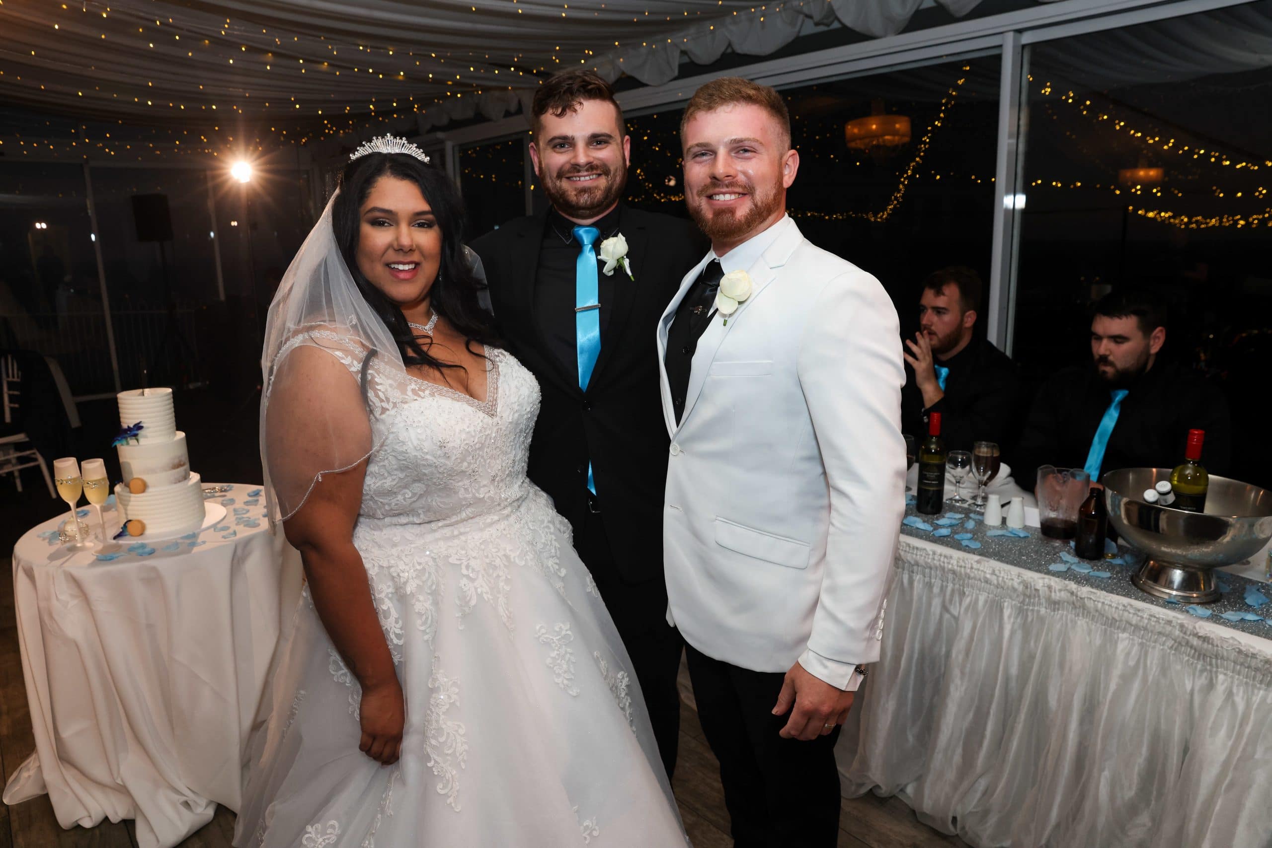 Nathan Cassar with a bride and groom