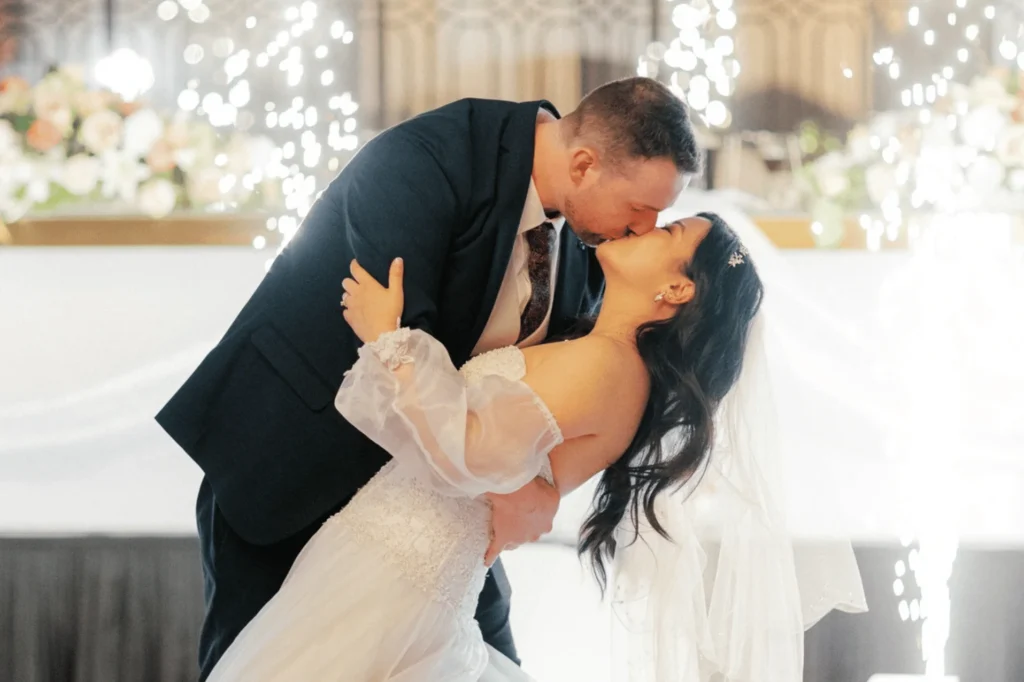 Thu & Sam at The Highline Venue in Bankstown having their first kiss as a married couple